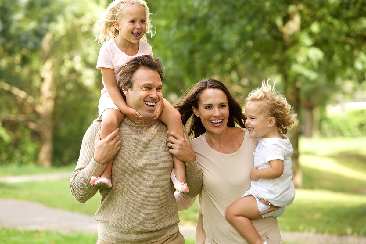 Happy parents with two children