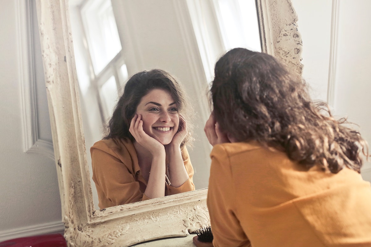 Mother looking into the mirror